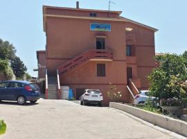 Guest House Tra Rocce E Mare, hôtel à La Maddalena