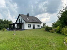 Biały Dom nad jeziorem Rajgrodzkim, Ferienhaus in Krzywe