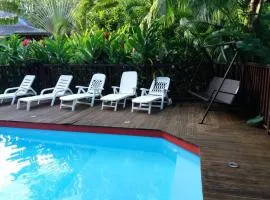 Bungalow d'une chambre avec piscine partagee jardin amenage et wifi a Pointe Noire