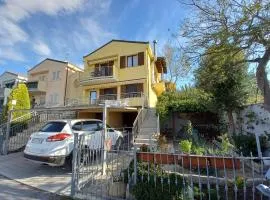 Villetta con giardino e parcheggio coperto