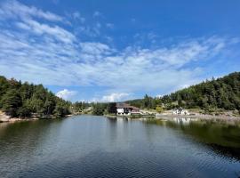 Hotel Am Wolfgrubenersee, plážový hotel v destinaci Soprabolzano
