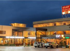 Vijay Inn by Unicorn: Krishnagiri şehrinde bir otoparklı otel