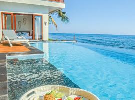 Air Sanih Beach Villa โรงแรมในKubutambahan