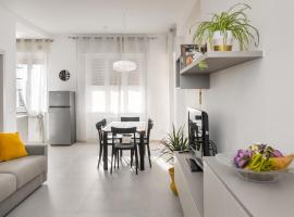 Civico40 Luminoso appartamento con balconi e garage privato