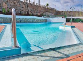 Malibu 2 apartamento con aire acondicionado, campo de tennis y piscina con solarium, отель в городе Пуэрто-Рико