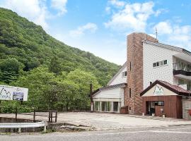 Tenjin Lodge, отель в городе Минаками