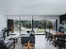 Lithic House -wood fire and bush views
