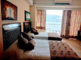 Suite en torres gemelas con vista al mar, hotel in Acapulco