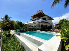 Joya' Beach Suites & Villa, отель в Джамбиани