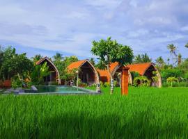 Umma Bali Menjangan Retreat, парк-отель в городе Баньюведанг