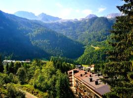 View-stunning 2 BR apartment in the heart of Alps, cheap hotel in Sella Nevea