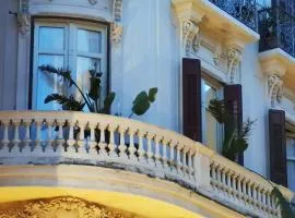 Historic 19th-Century Apartment with Balcony Overlooking Plaza