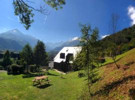 Appartement dans chalet avec jardin, vue montagne, apartment in Aucun