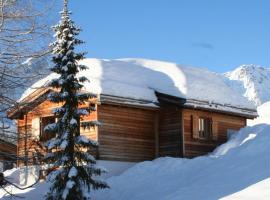 Chalet Höckli Wohnung 2., viešbutis mieste Aroza