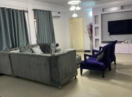 A beautiful 2-bedroom apartment at a secured estate with 24 hours security and power, Dstv and Wifi ready., hotel in Moba