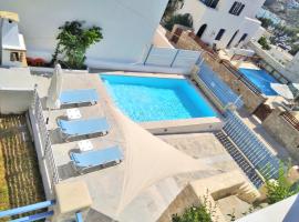 Villa Danae - Seaside Villa with Pool & Hot Tub: Piso Livadi şehrinde bir villa