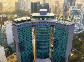 Sky Suites with KLCC Twin Tower View by iRent365, sted med privat overnatting i Kuala Lumpur