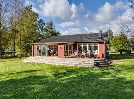 Nice holiday house in Knared, villa in Knäred