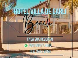 Hotel Villa De Carli Beach, отель в городе Риу-Гранди