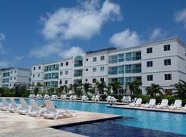 Palm Village Acqua - Apartamento Premium - Em frente à piscina - Porto de Galinhas โรงแรมใกล้ หาดกูเป ในปอร์โต จิ กาลินญาส
