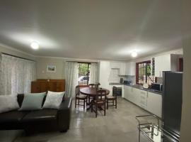 Man and Dog Log Cabin, hotel v destinaci Midrand
