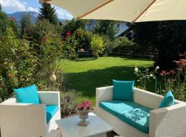 Charmantes Garten-Apartment: Erholung im Chiemgau, hotel with parking in Unterwössen