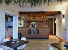 Una finestra sulle Alpi, hotel v destinaci Bema