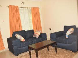 Stylish 2BR with Wi-Fi and secure parking, hotel near Car Park, Kakamega