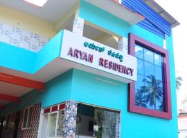 Aryan residency, hotel com estacionamento em Māvalli