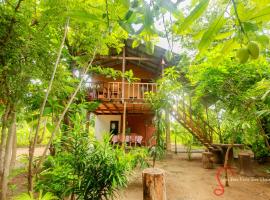 Sigiri Free View Tree House & Villa, отель типа «постель и завтрак» в Сигирии