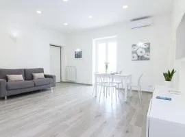 FOUR WHITE APARTMENTS