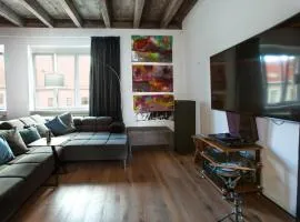 Contemporary apartment with fireplace & terrace