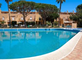 Adosado con jardín y piscina en Chiclana Barrosa-Sancti Petri