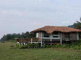 Away cottage, hotel in Dhoāpālong