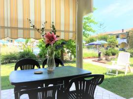 Enjoy the sun from the garden of our flat, viešbutis mieste San Michele al Tagliamento