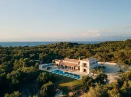 Stone villa situated in the heart of an impressive estate, in one of the most scenic and secluded parts of Corfu’s northeast iconic Mediterranean coastline.
