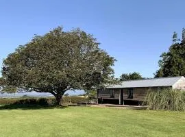 The Cabin at Barnstormers, luxury woodland setting