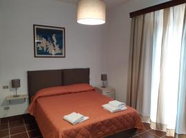 Oikos Apartment: Bosco'da bir otoparklı otel