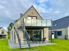 Ferienhaus Panoramadeck am Harkebrügger See mit Sauna und Kamin