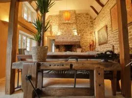 KERBELEG, ferme-manoir du XVè siècle, chambres grand confort