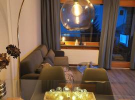 LAAX Central Holiday Apartment with Pool & Sauna, feriebolig ved stranden i Laax