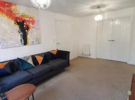 Garland Modern 4 Bedroom House with Garden & Parking