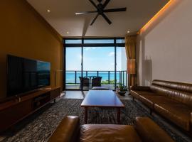 Condominium NOOSA, hotell i Nago