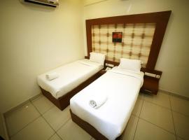 AURA RESIDENCY, hotel a Payyannūr