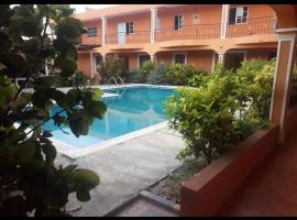 Room in Guest room - Apartahotel Next Nivel - Queen Room, hotel en Punta Cana