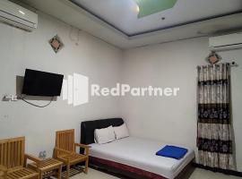 Hotel Raymona Kutai Syariah RedPartner, hotel v destinaci Loakulu