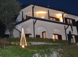 Le Grigne Guesthouse - The Garden, appartement in Oliveto Lario