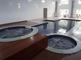 Vários Flats no CAVALINHO BRANCO com PISCINA COBERTA E AQUECIDA