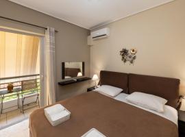 Viesnīca A&J Apartments or Rooms athens airport pilsētā Markopula