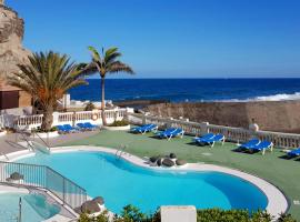Maravillosa vivienda con piscina al lado del mar, hotel near Las Terrazas Shopping Centre, La Estrella